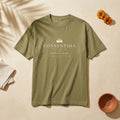 CONSENTIDA Palabra Tee in Faded Army: garment-dyed heavyweight cotton tee printed with a crown on a tufted pillow and the line “Spoiled. Knows it. No regrets.”
